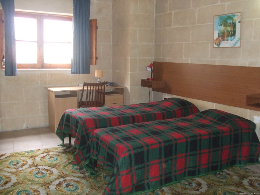 Twin sharing room . | Budget Getaway  at Sliema Homestay Malta | Image #5/9 | 
