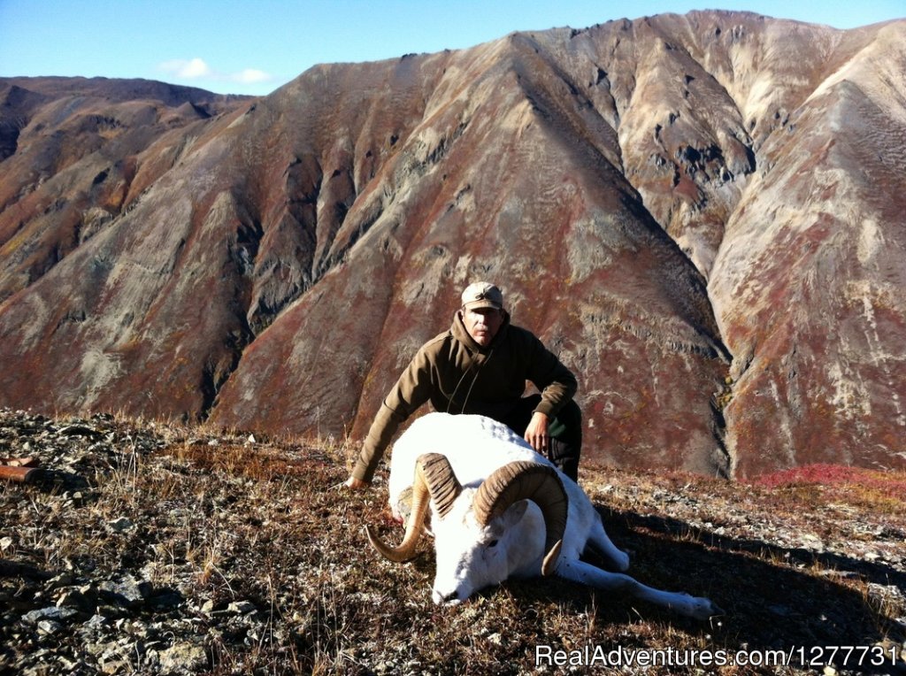 Hunter with Sheep | Stephan Lake Lodge | Image #4/13 | 