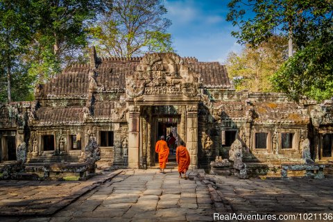 Buddhist monks enter one of the many Angkor temples,Cambodia