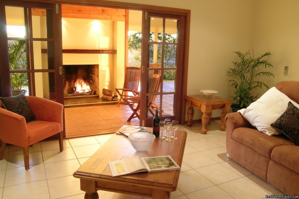 The Summit Rainforest Retreat open fireplace | Cairns Highlands Accommodation & Itineraries | Image #3/10 | 