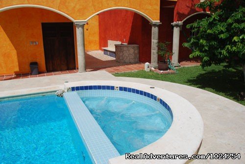 Jacuzzi and dive rinse tank, rack, and outdoor shower. | Casa Colonial, Cozumel Vacation Villas | Image #3/8 | 