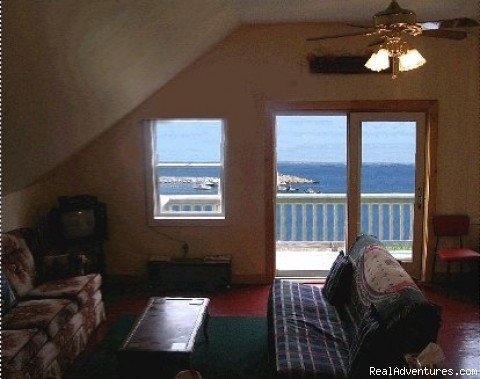 Living Area (w Double Bed/Couch) | Matinicus Island Oceanfront Getaway Cottage | Image #2/10 | 
