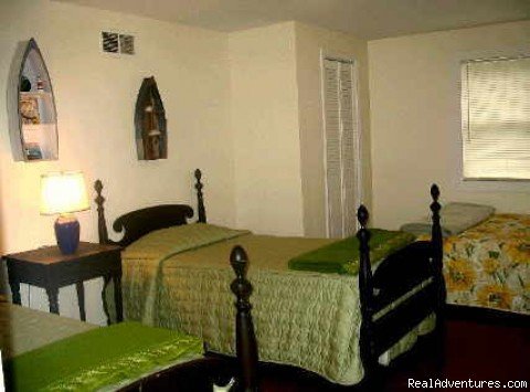 Bedroom #2 (1 Queen, 2 Twin Beds) | Matinicus Island Oceanfront Getaway Cottage | Image #6/10 | 