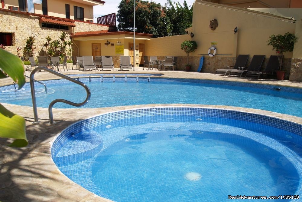 Our Solar-heated Infinity Pool And Jacuzzi By Day | 3.5 star value-priced hotel by airports & San Jose | Image #10/11 | 