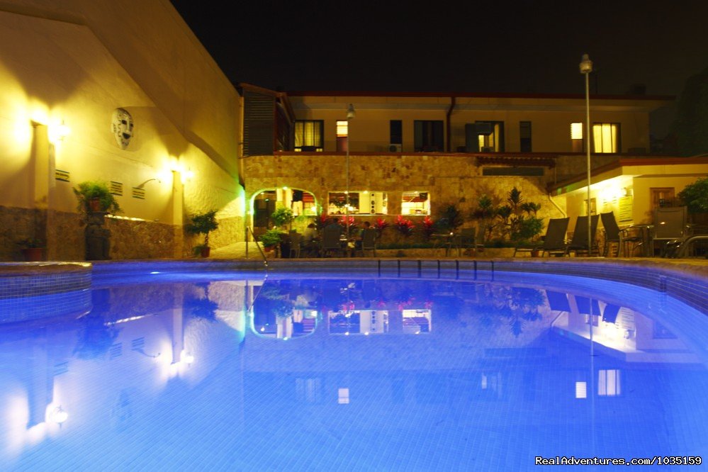 Solar-heated Infinit Pool At Night | 3.5 star value-priced hotel by airports & San Jose | San José, Costa Rica | Hotels & Resorts | Image #1/11 | 
