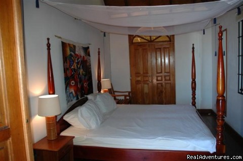Englishman's bay,Parrot estate. Romantic adventure: One of two similar bedrooms