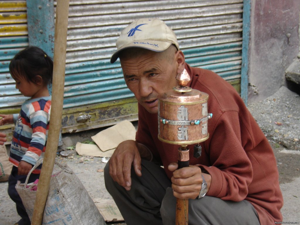 Ladakhi Man with prayer wheel | Motor Cycle Tours to India , Nepal - 2012 & 2013 | Image #10/14 | 
