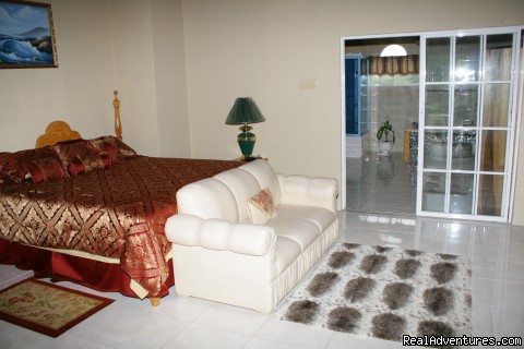 Luxurious Ocho Rios OceanView Villa:Inclusive rate: Master bedrom with sliding doors leading to Ensuit bathroom