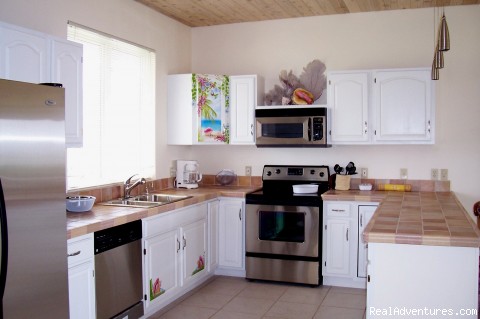 Bonefishing or snorkeling at your doorstep!: Conch Cottages kitchen