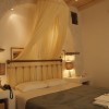 LIVE YOUR MYTH IN MYKONOS AT RANIAS APARTMENTS  MAIN BEDROOM OF STUDIO WITH TWO AREAS AND SEA VIEW