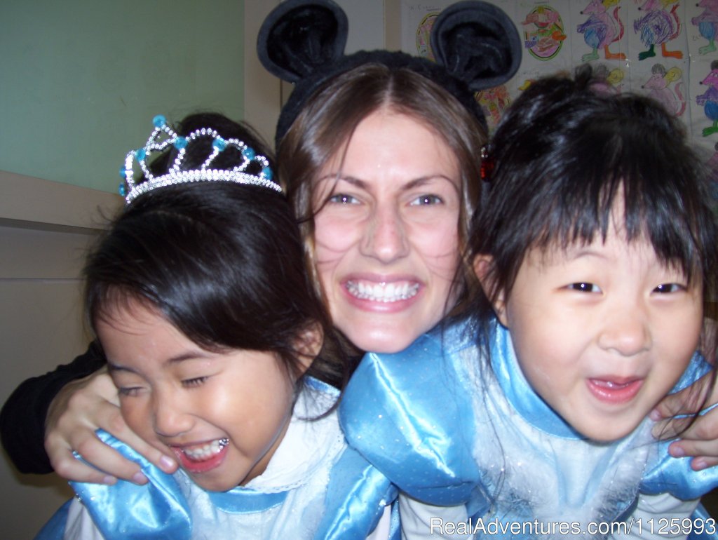Western teacher with students | English Teaching Jobs in South Korea | Image #6/7 | 