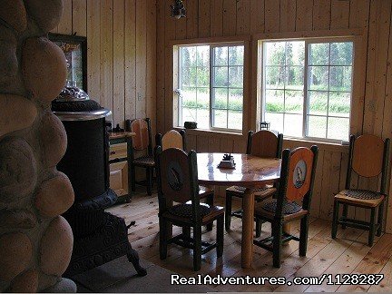 River front dining room with working pot belly stove