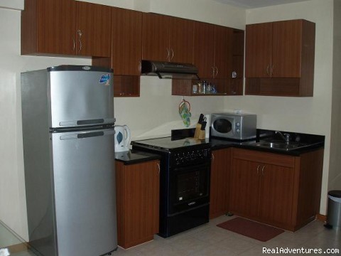 City Resort Residence right in Ortigas: Fully-equipped kitchen