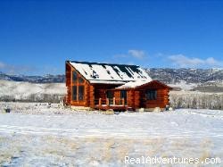 Romance & Adventure at the Montana Beartooth Cabin: View of house from property in Winter