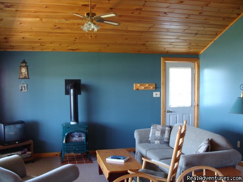 Romantic Beachfront Cottage: Cottage Interior- Cathedral Ceiling/Propane Stove