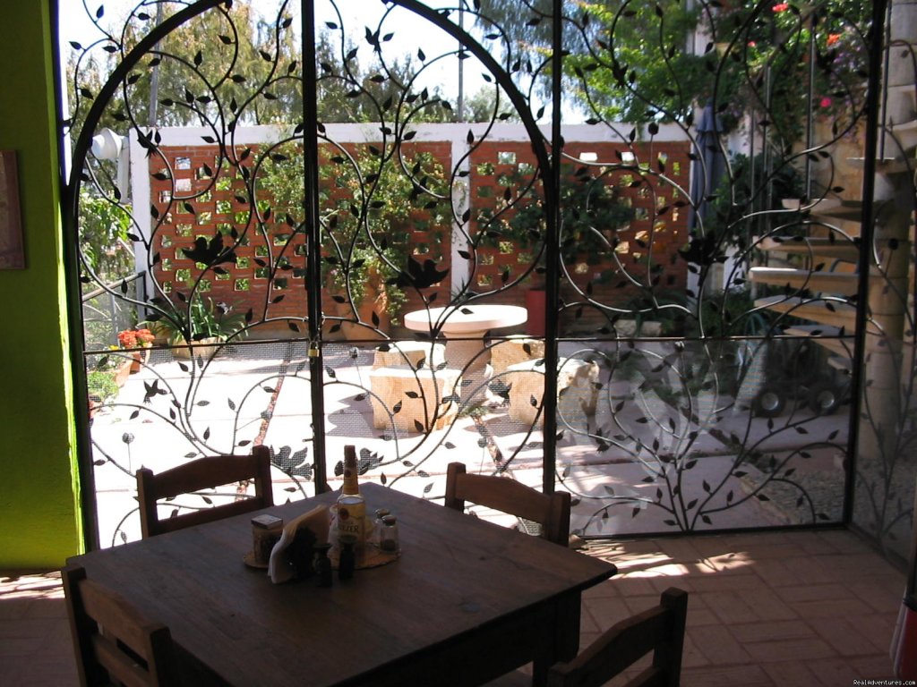Wroght iron gates from kitchen to your patio | Casa Machaya Oaxaca Bed & Breakfast | Image #4/7 | 