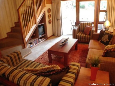 Safari getaway in luxury golf and wildlife resort: Lounge with French doors leading to patio