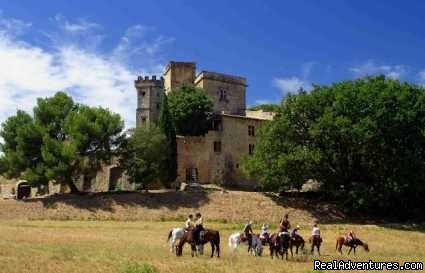 Riders in front of the Lourmarin's Castle | Cap Rando - Horseback Riding Vacations In Provence | Image #2/4 | 