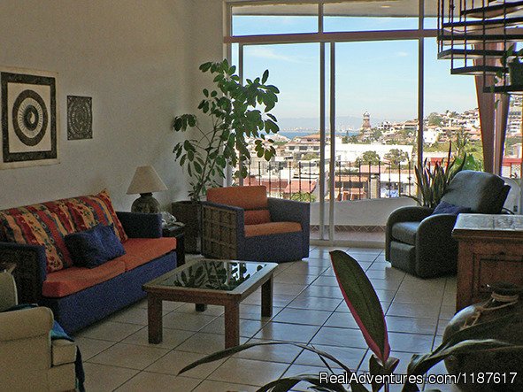 Unit 1 Living Room w/spiral staircase to rooftop terrace | 2+ bdrm condo in the Romantic Zone | Puerto Vallarta, Mexico | Vacation Rentals | Image #1/6 | 