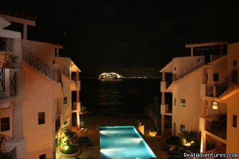 cruiseship at night | Beachfront Penthouse in Town with Infinity Pool | Image #2/3 | 