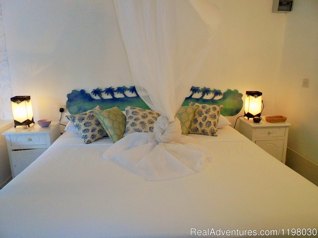 Blue Bamboo Bedroom | Mango Beach Inn, Adventure Lodge | Image #2/26 | 