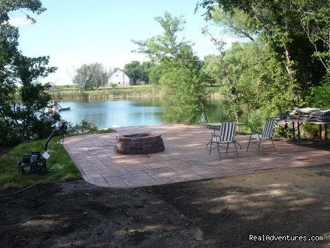 patio/firepit by the pond - InnSpiration Bed & Breakfast- A Country Getaway - northwest: sioux rapids iowa bed & breakfasts