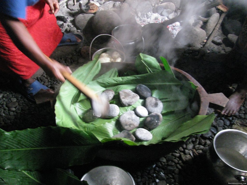 Cook in Wooden Bowl (Popo) using red hot stones | Villagestay & Trekking In Solomon Islands. | Image #9/14 | 