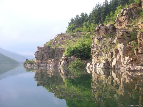 Awesome Rocks For Jumping Into The Clear Water Of The Lake