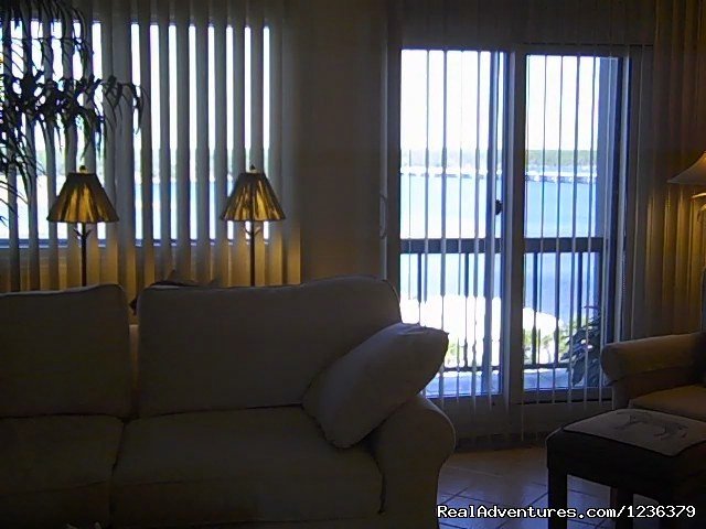 View of the balcony from the family room. | Luxury Waterfront Condo on Panama City Beach | Image #6/11 | 