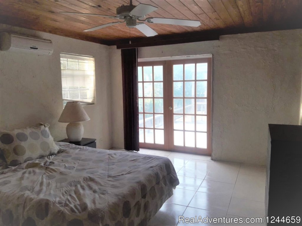Each Room Has A Fan And Aircondition Unit | Charming 2Bed/2Bath Cottage On Secluded Pink Sand | Image #9/13 | 