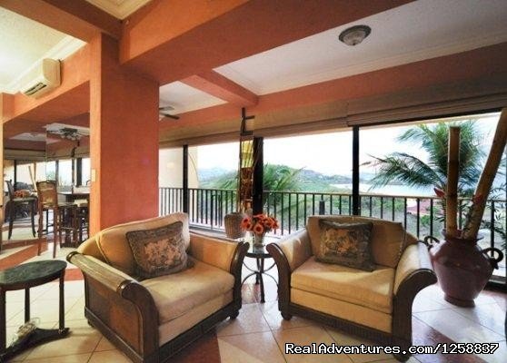 Living Room | Million Dollar Ocean Views - Playa Flamingo Condo | Image #2/12 | 