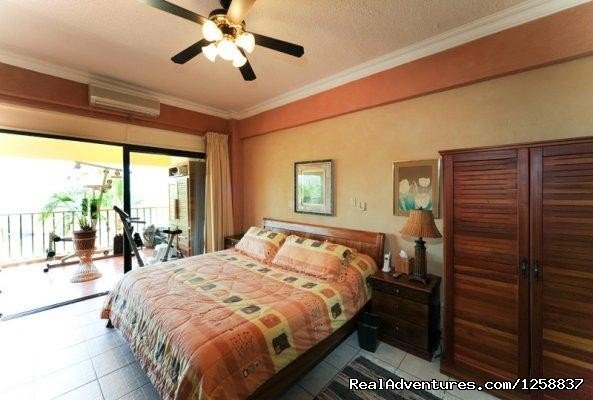 Master Bedroom | Million Dollar Ocean Views - Playa Flamingo Condo | Image #5/12 | 