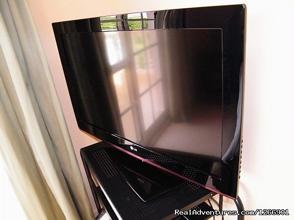 Your 32 inch Flat screen TV | Caribbean Luxury For Less - Quiet but Near all | Image #7/13 | 