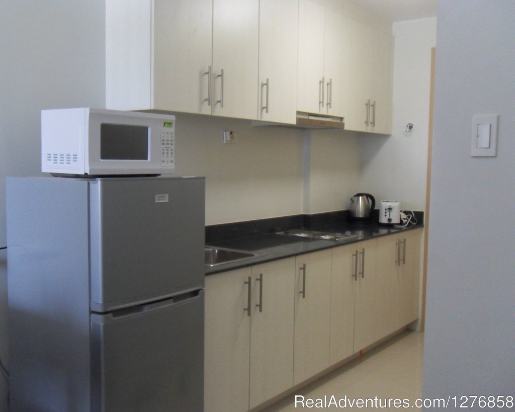 Fully equipped kitchen | Sea Residences Condominium next to SM Mall of Asia | Image #12/19 | 