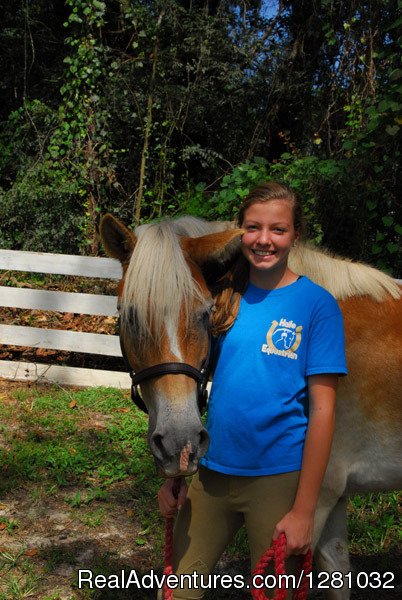 Student and Pony | Haile Plantation Equestrian Center | Image #3/7 | 