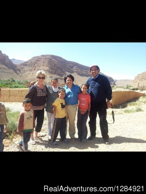 Hamid and his American clients with Berber kids