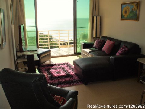 Living Room with balcony overlooking Ocean