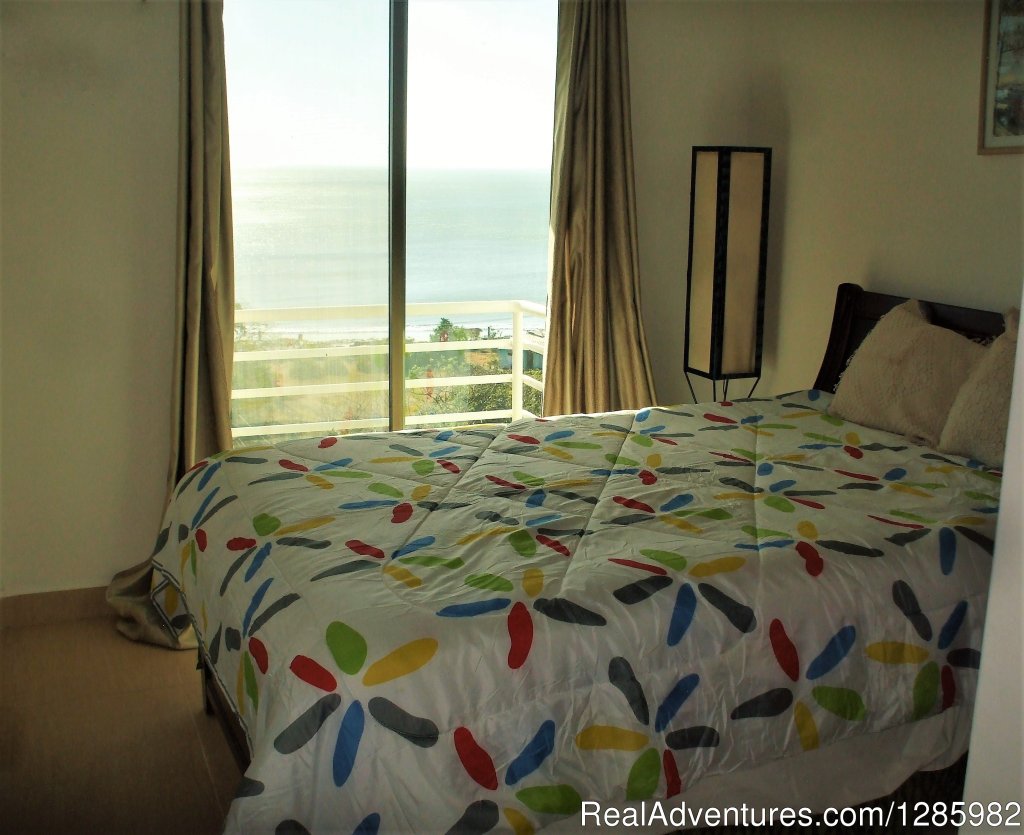 Guest Room with Juliette balcony overlooking ocean | Ocean View 2 bed/2 bath apt with pool in Gorgona | Image #6/7 | 